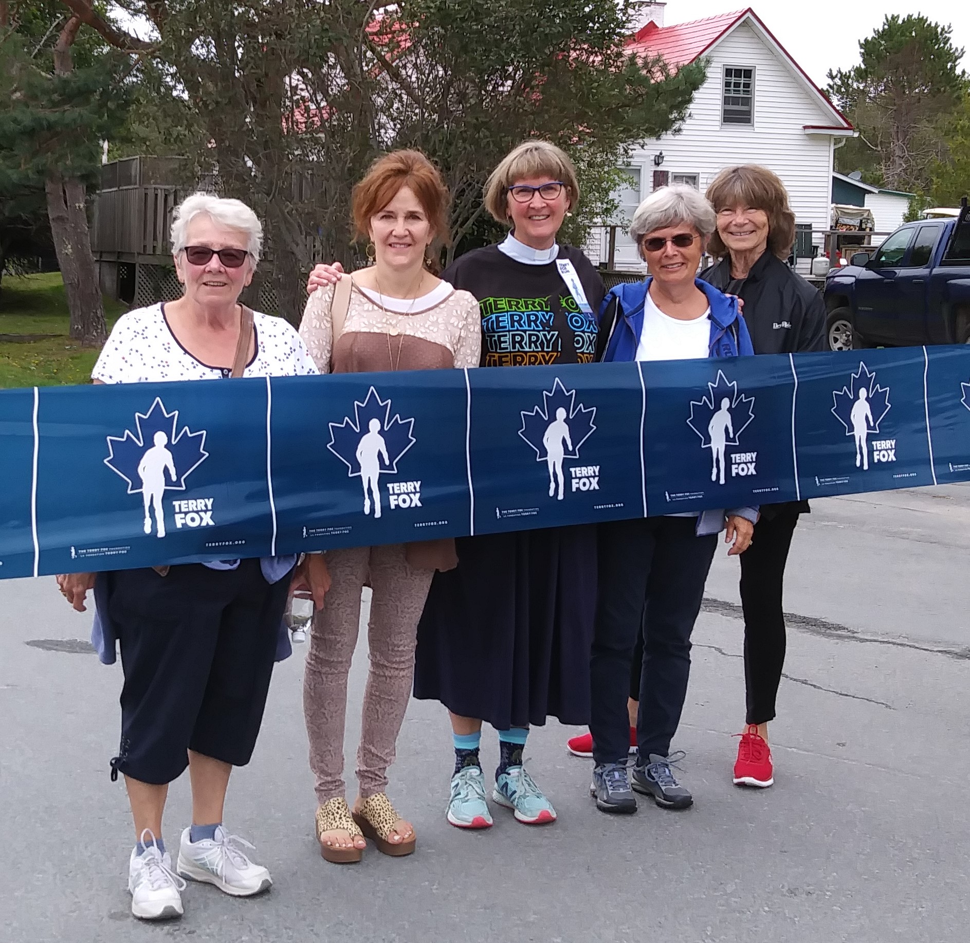 On Sunday, September 15, the Annual Terry Fox Run was held at the Shore Club in Hubbards. 
	<br>This year's run was dedicated in memory of Sanny Blakney. 
	<br>Family and friends gathered to honour Sanny's participation in the previous 38 Terry Fox Runs. 
	<br>Pictured from left to right is Darryl (sister in-law), Dawn Marie (niece), Rev. Laurie, Carol and Stephanie.